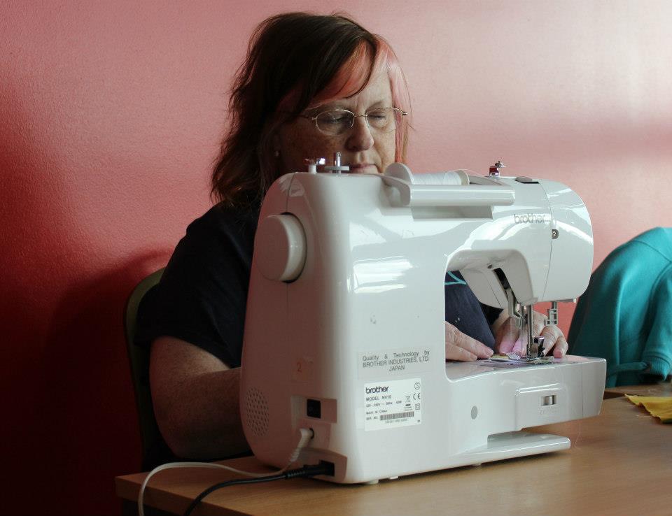 Rosie Eley, smiling — the Leicester Morsbagger known as Offcuts
